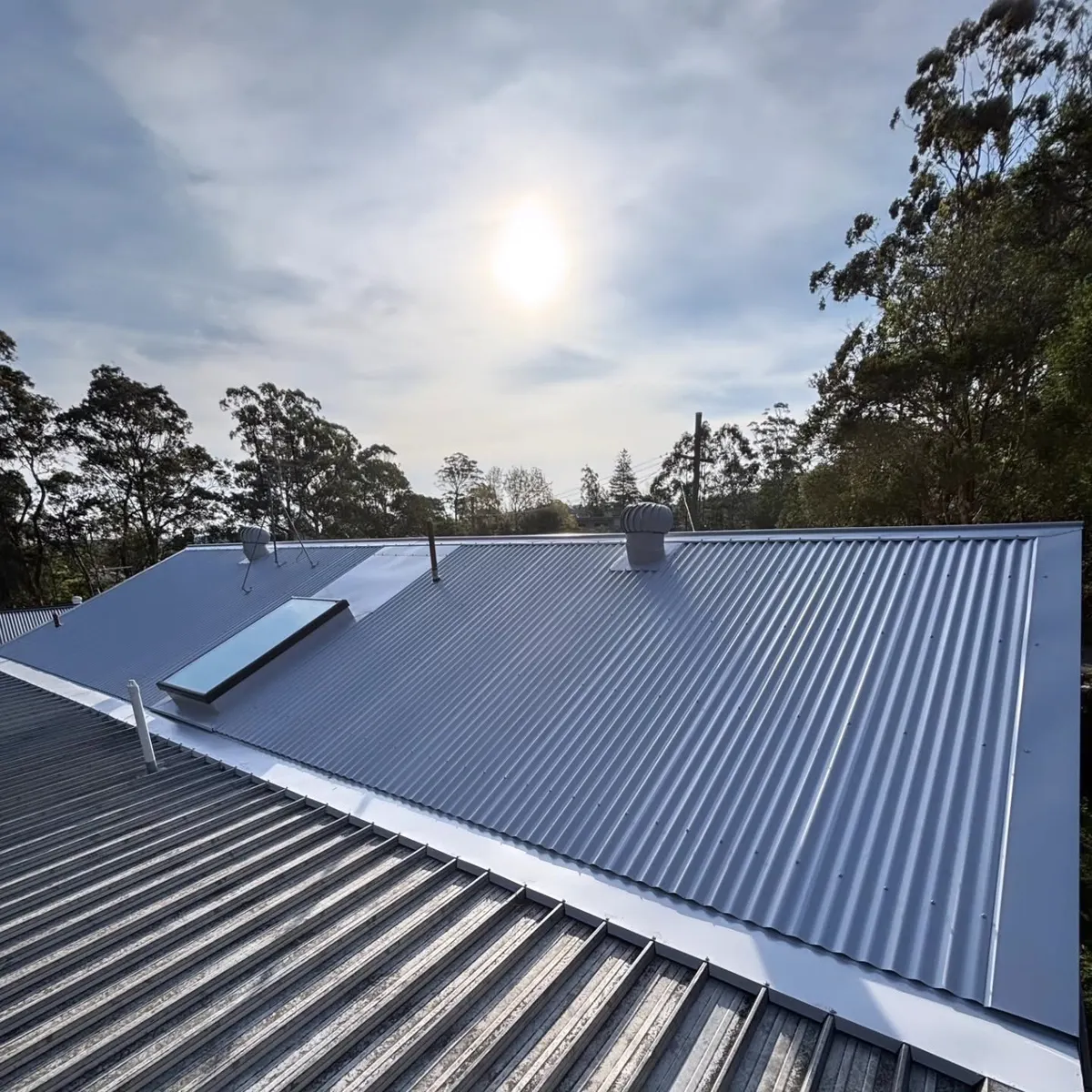 Skylight set into a finished metal roof
