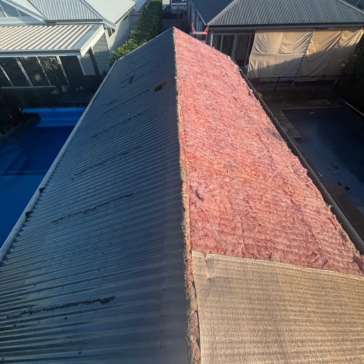 Re-roof beside a pool: during