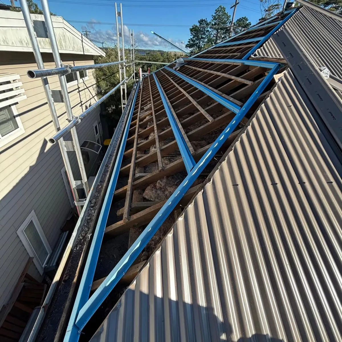 New steel battens fixed over the roof frame during a re-roof